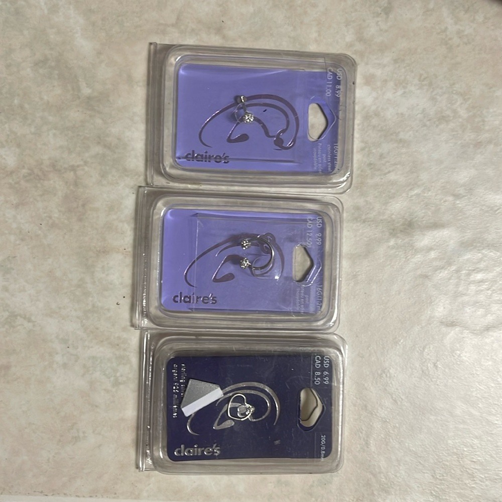 Claire’s Sterling silver and stainless steel single earrings